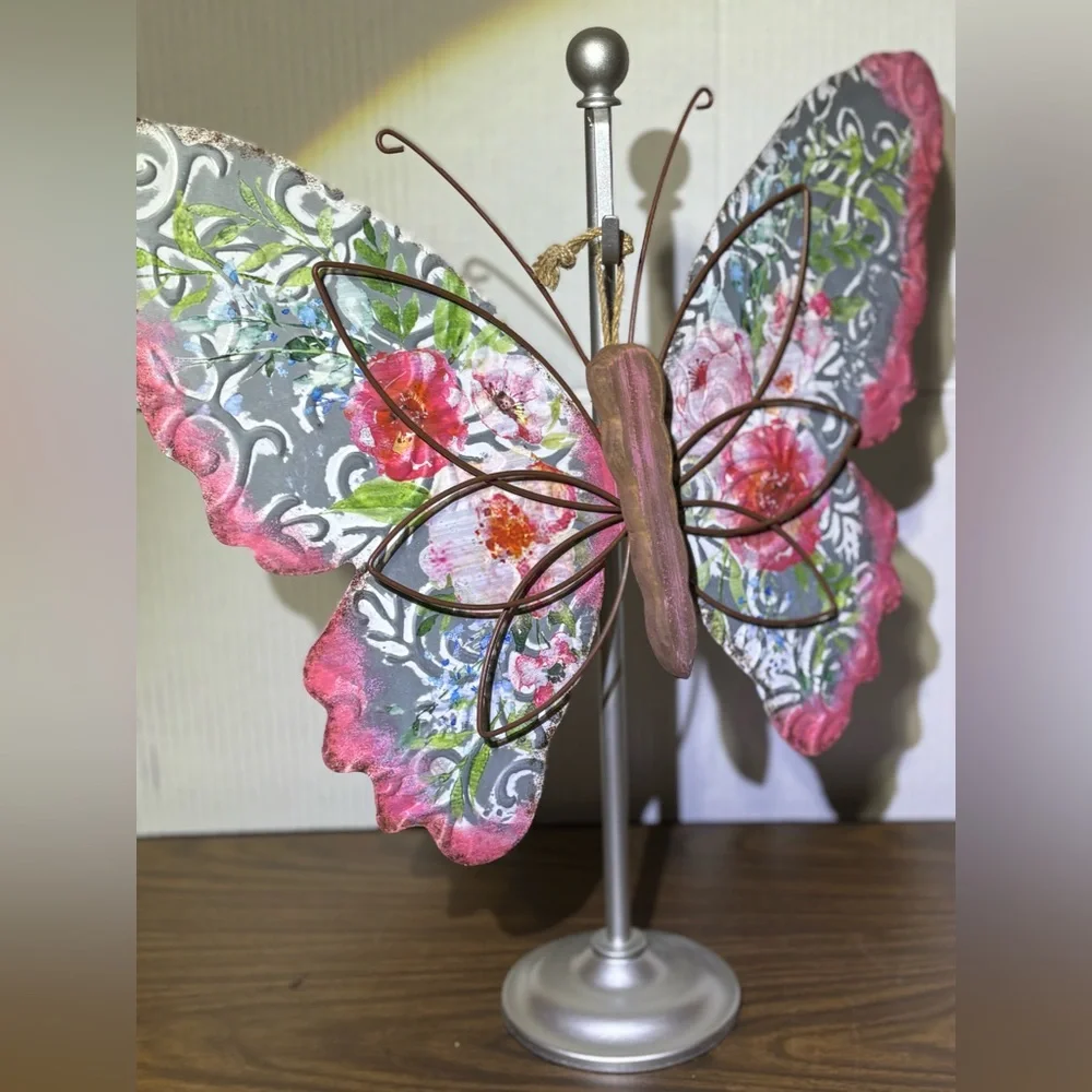 Metal butterfly w/wood accents Hanger on back Perfect for a patio or inside 18.5